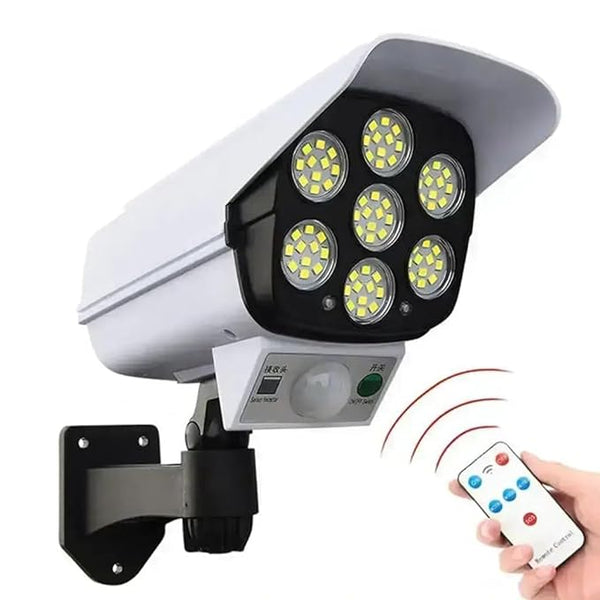 Security camera with LED lights and remote control on a white background